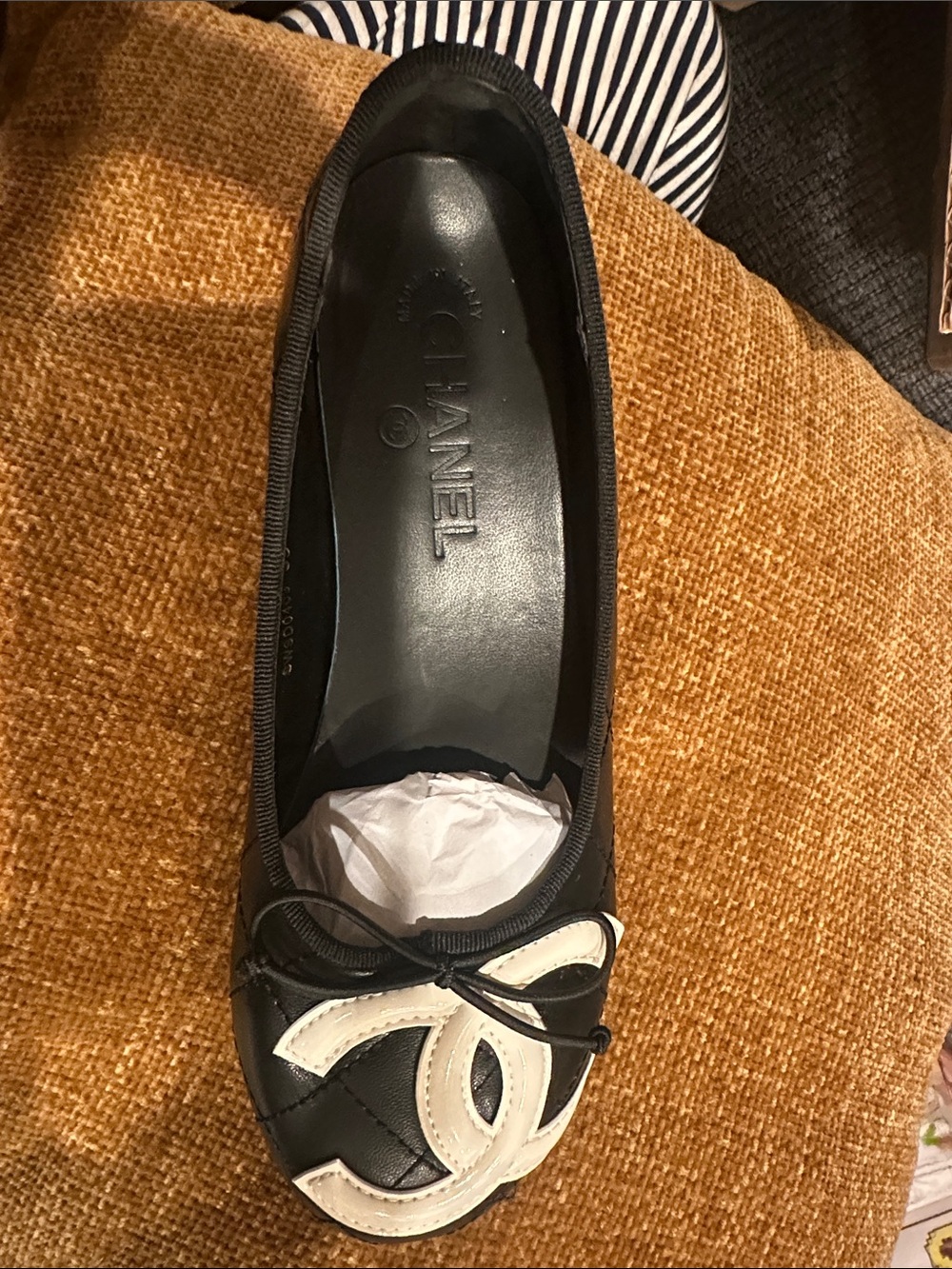 CHANEL Black Leather Quilted Ballet Flat with White CC Toe Accent